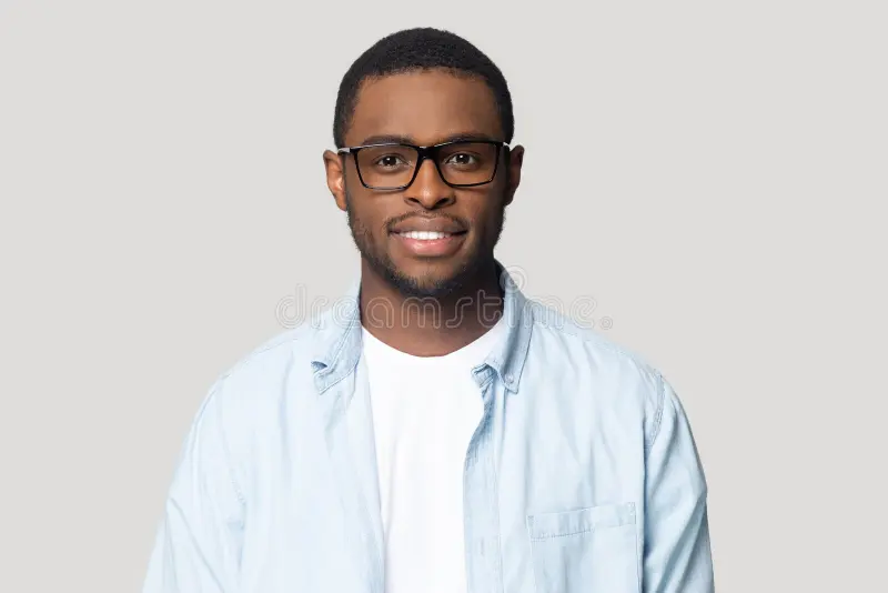 headshot african american male glasses posing studio portrait smiling man wearing casual clothes look camera image 153874435